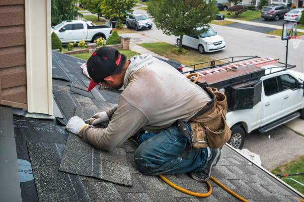 Professional Flat Roof Repair technician working in Blessing, TX